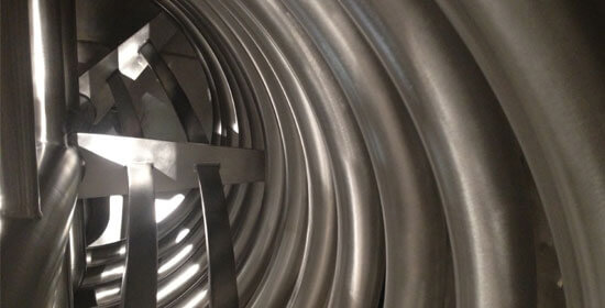 Horizontal cooker for food processing View of the coil within the horizontal cooker